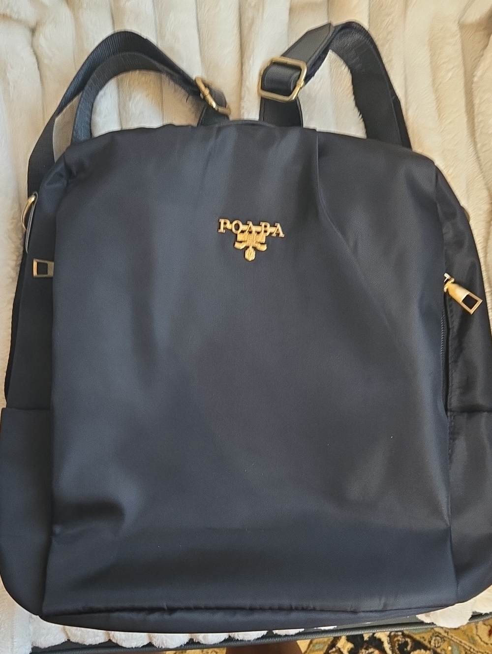 Black Nylon Backpack Bag with Gold Accents Safe And Stylish Travel